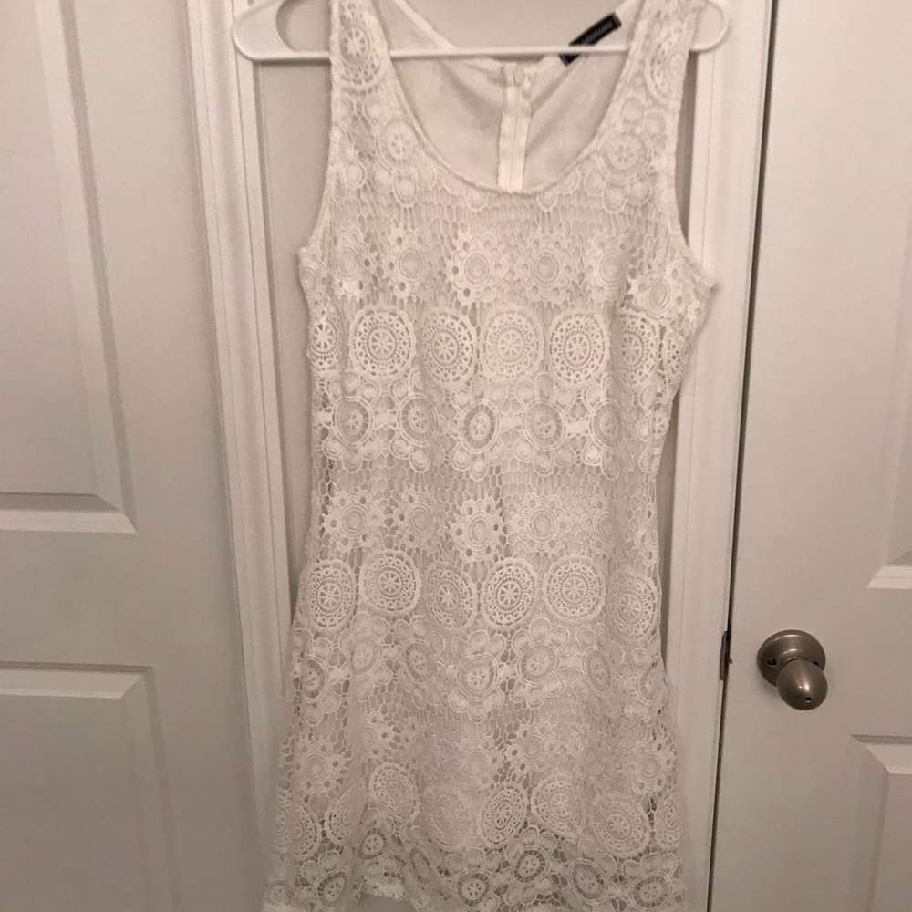 Beautiful white lace sleeveless dress
